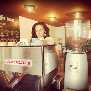 Coffee Circus Joy barista behind coffee machine