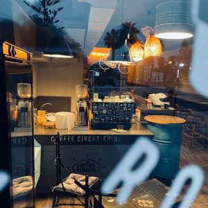 Coffee Circus China cafe interior view through window with espresso bar