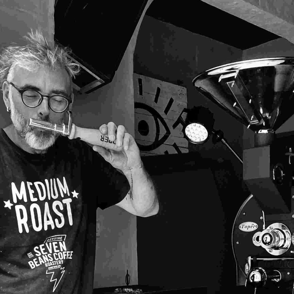 Coffee Circus founder roasting specialty coffee beans at Malta roastery